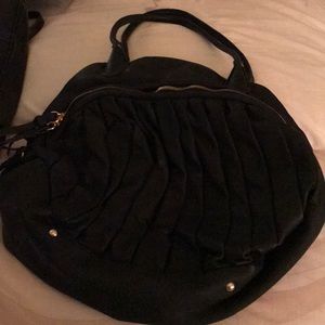 SABINA New York  Large black sack pocketbook.